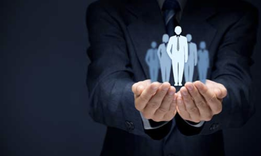 Photo of a man with hands cupped holding 5 miniature persons, representing undue influence over others in a Texas will contest